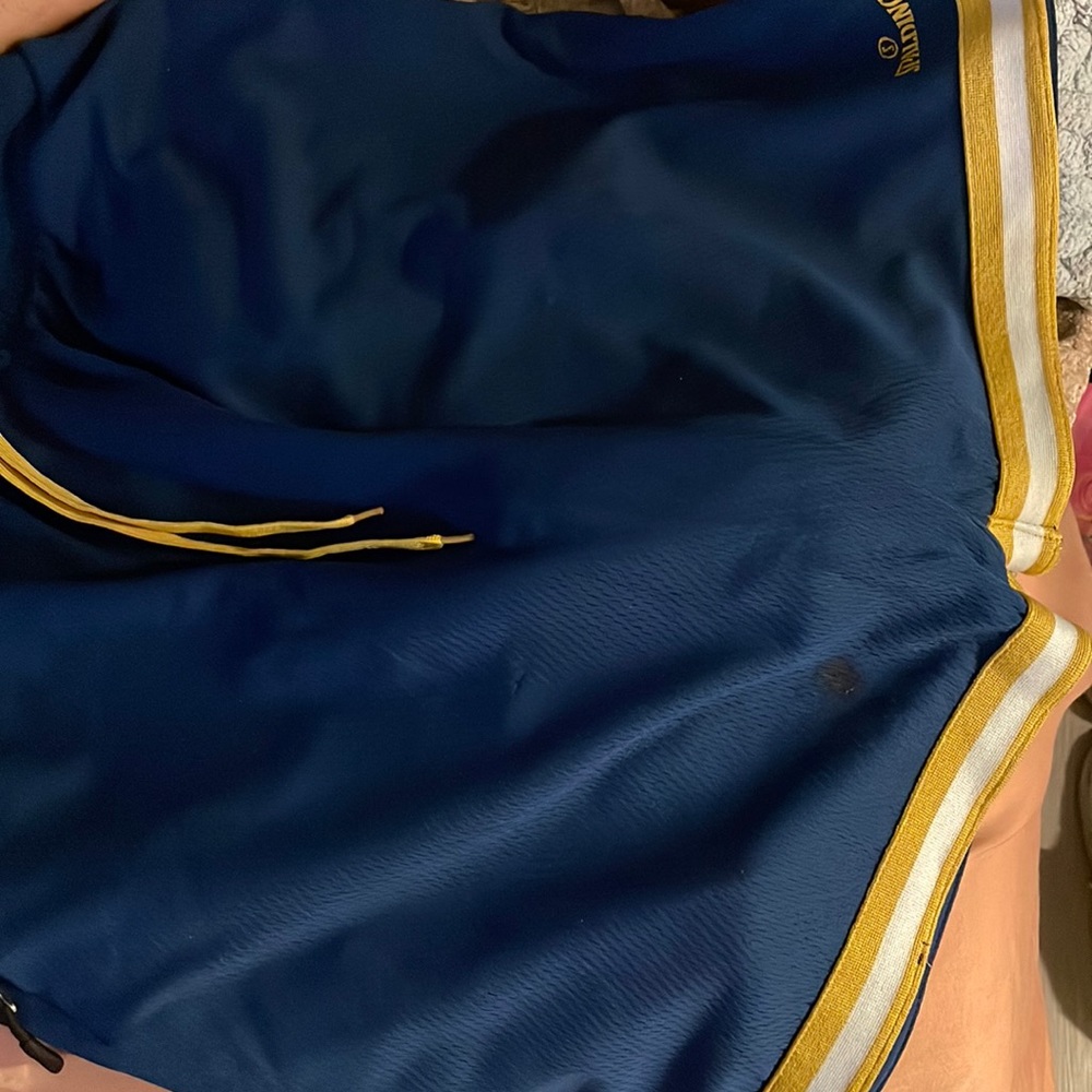 blue and yellow spalding shorts